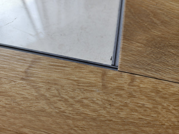 Caja piso laminado 6pz 2.487m2 5mm con 1mm EVA bajoalfombra